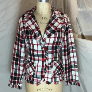 Veston carreauté à franges