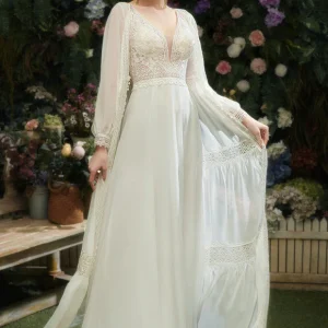 Robe De Mariée Fluide À Manches.